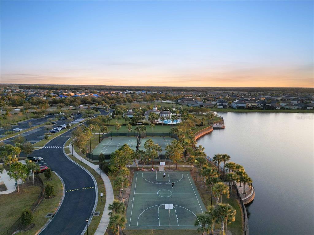 14339 Easy Goer Street Ruskin, FL 33573 - Photo 57 of 71 a view of a lake with a city view