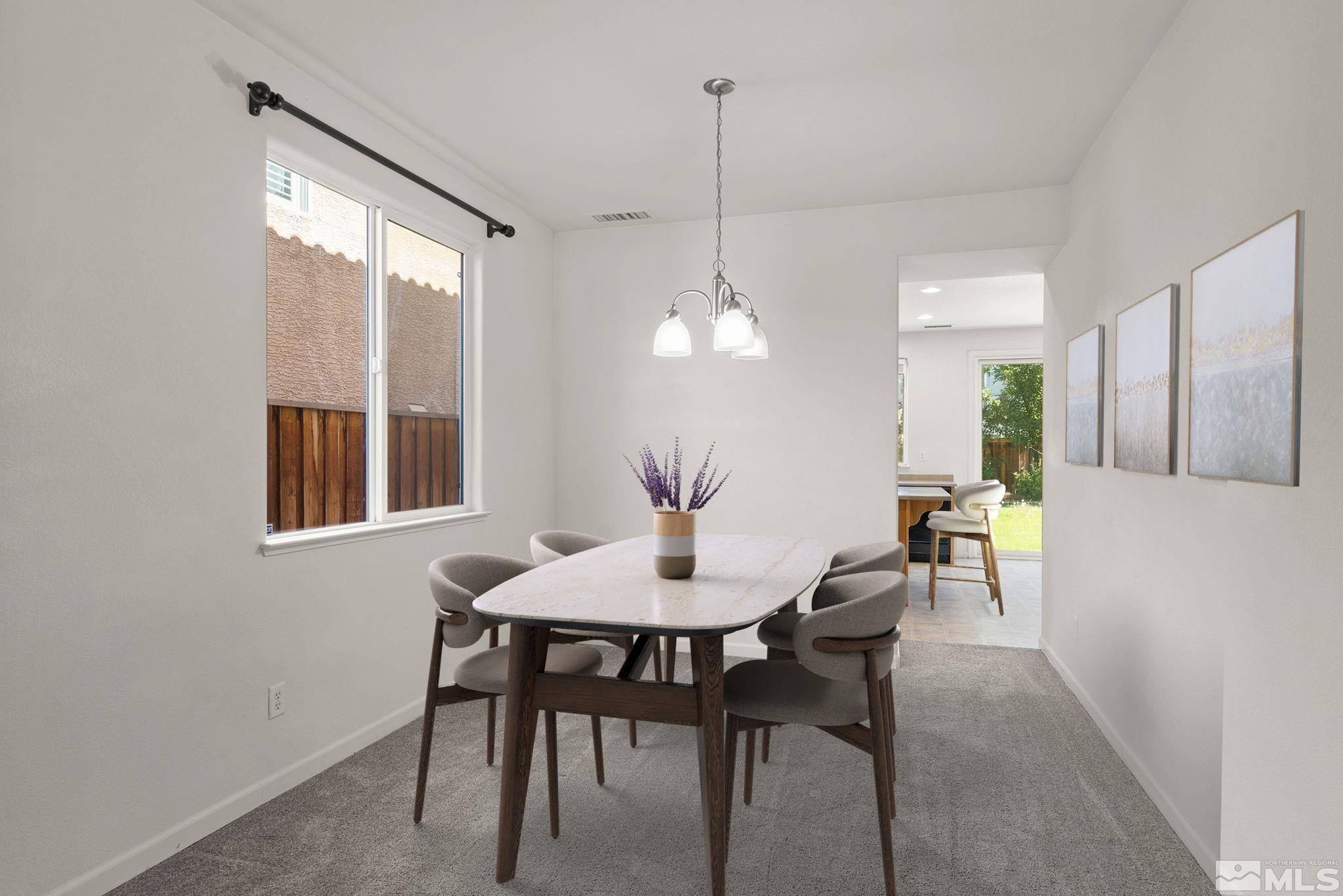 11290 Messina Way Reno, NV 89521 - Photo 6 of 26 a dining room with furniture and window