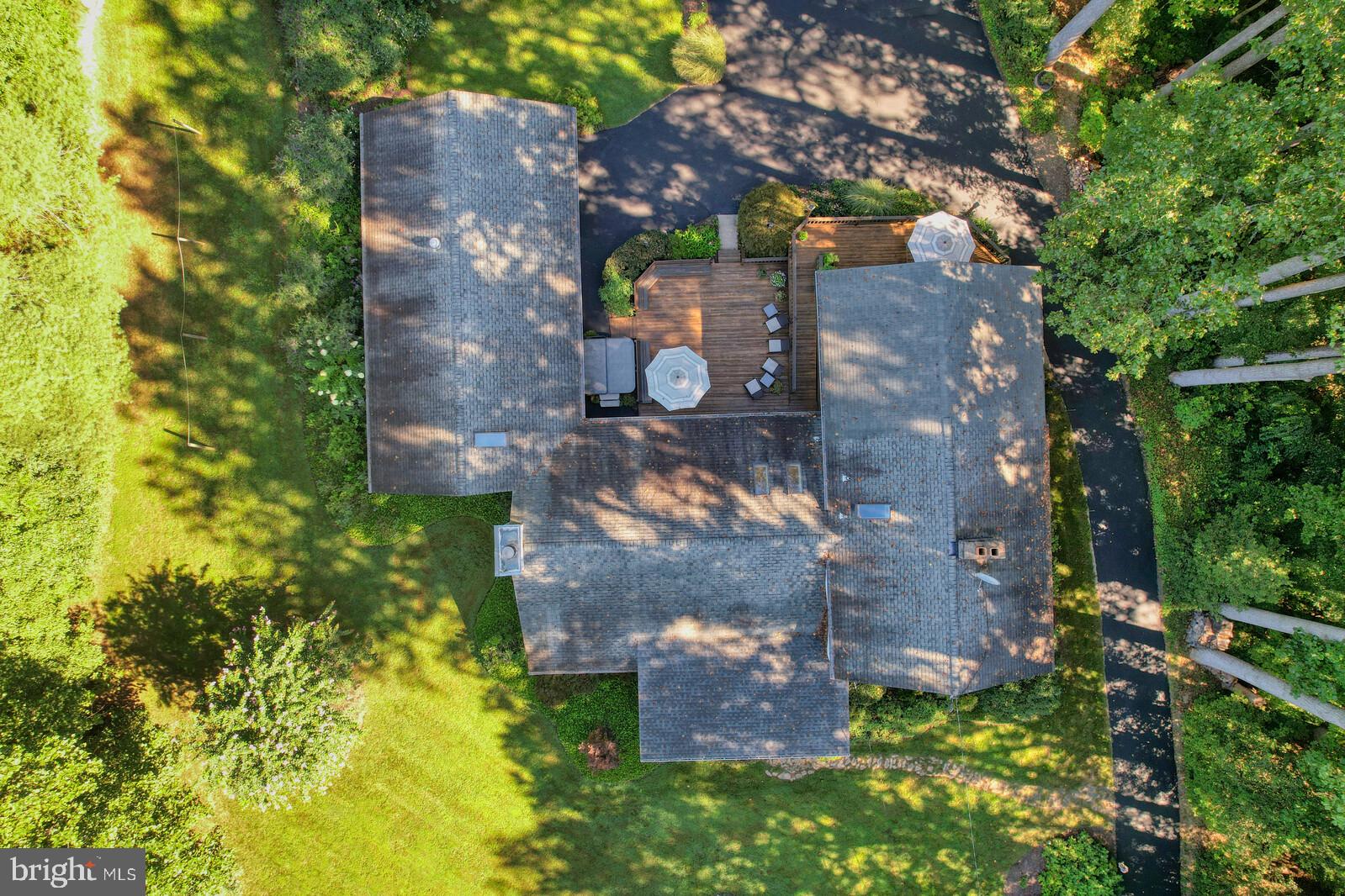31 Haviland Mill Road Brinklow, MD 20862 - Photo 12 of 36 an aerial view of a house with a yard and large trees