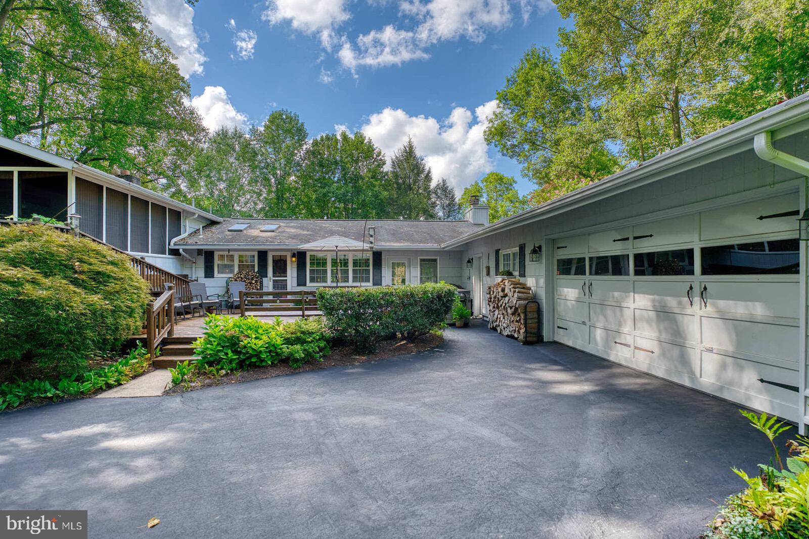 31 Haviland Mill Road Brinklow, MD 20862 - Photo 16 of 36 a front view of a house with a garden
