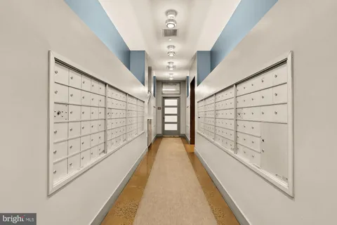 a view of a entryway with window and chandelier