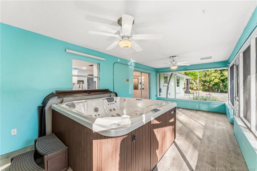 1201 Oak Avenue Fort Pierce, FL 34982 - Photo 17 of 43 a view of a kitchen with a sink and chandelier fan