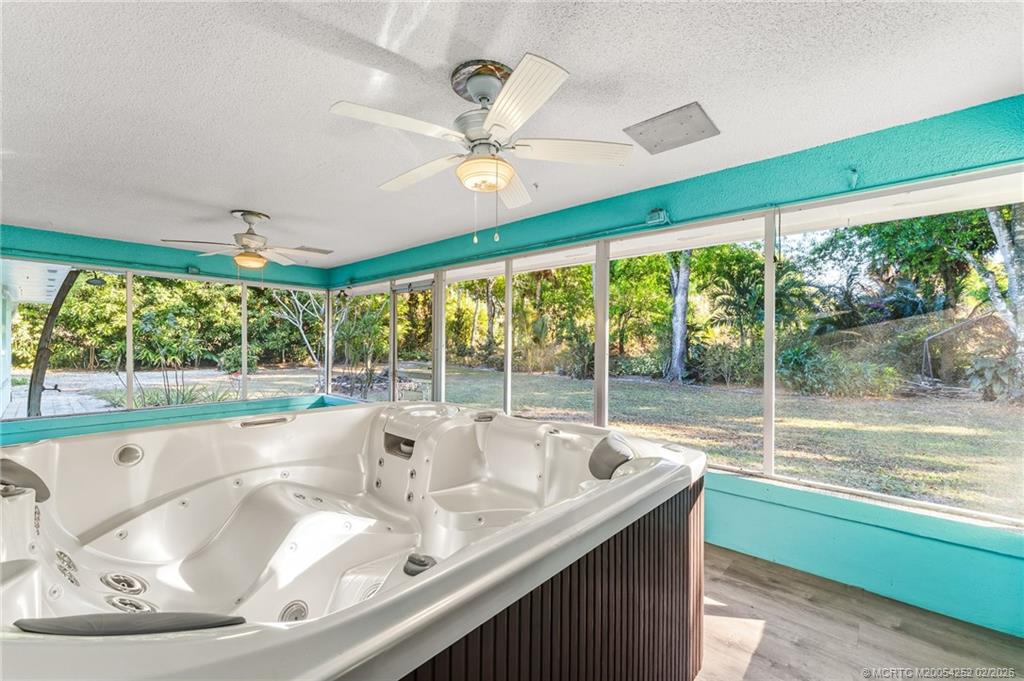 1201 Oak Avenue Fort Pierce, FL 34982 - Photo 18 of 43 a kitchen with a large window and a table
