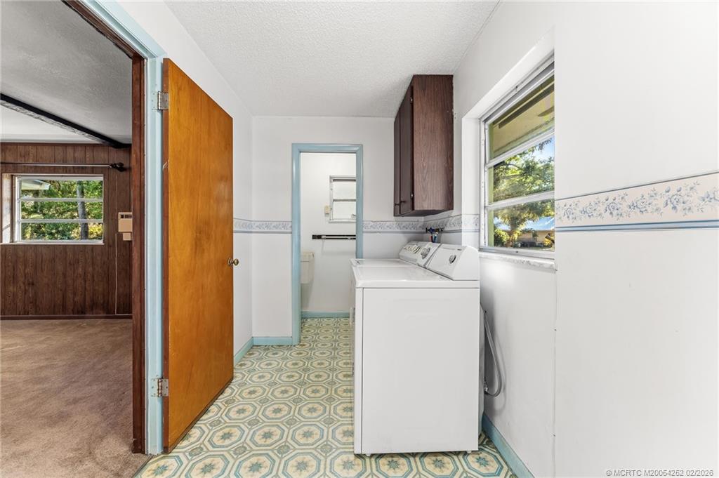1201 Oak Avenue Fort Pierce, FL 34982 - Photo 27 of 43 a utility room with dryer and washer