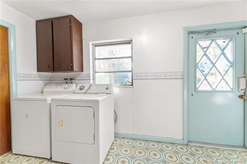 1201 Oak Avenue Fort Pierce, FL 34982 - Photo 28 of 43 a utility room with dryer and washer