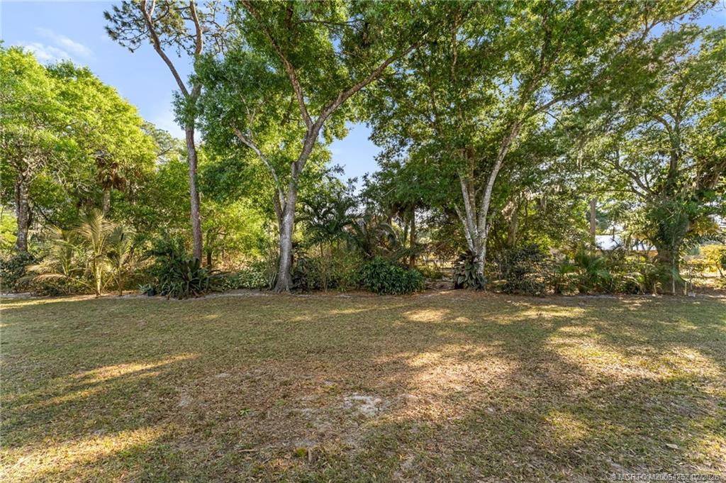1201 Oak Avenue Fort Pierce, FL 34982 - Photo 41 of 43 a view of a field with trees in background