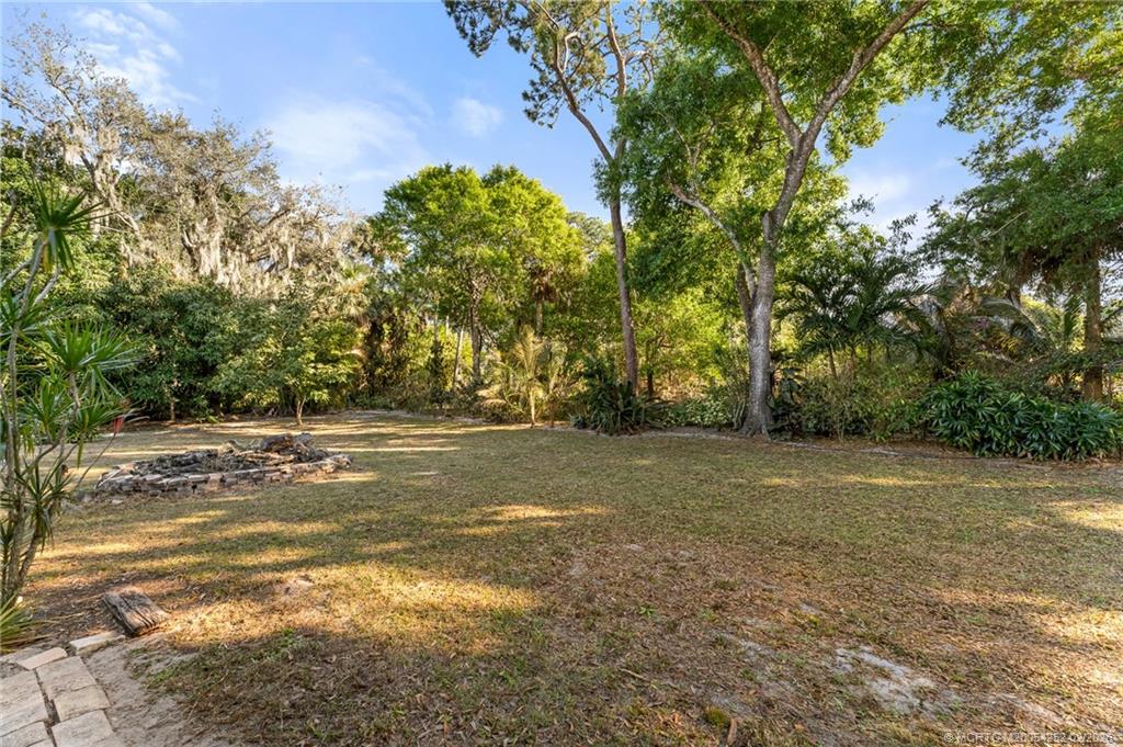 1201 Oak Avenue Fort Pierce, FL 34982 - Photo 42 of 43 a view of a field of grass and trees