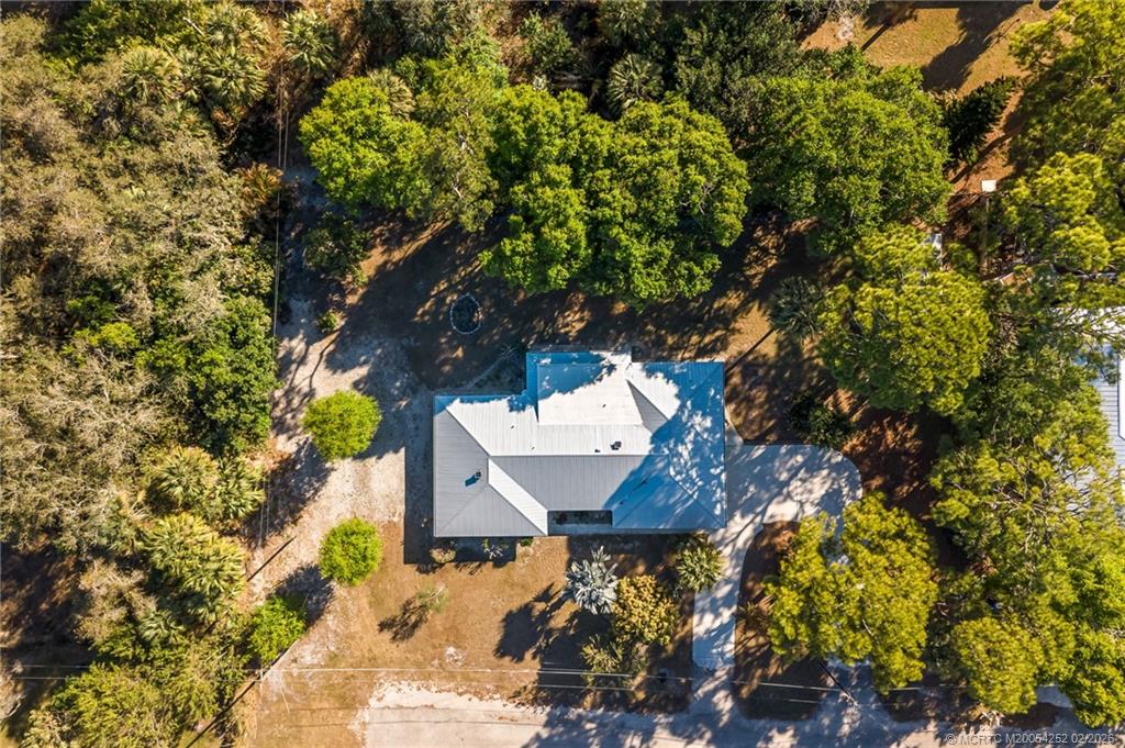 1201 Oak Avenue Fort Pierce, FL 34982 - Photo 5 of 43 a view of a tree in front of a house