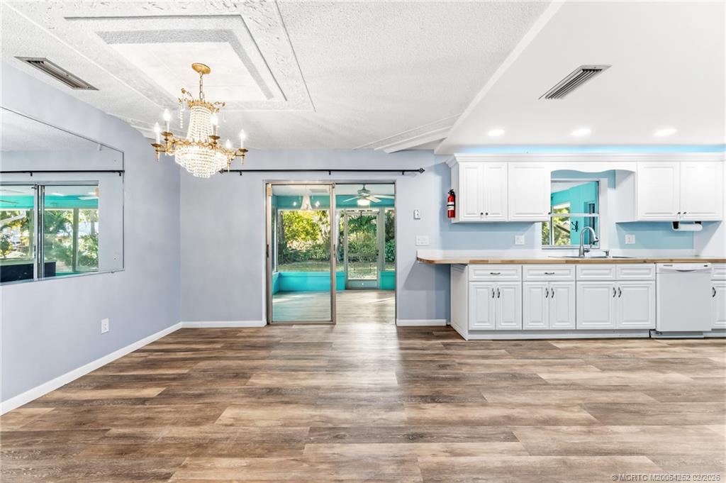 1201 Oak Avenue Fort Pierce, FL 34982 - Photo 6 of 43 a view of a kitchen with granite countertop a stove top oven