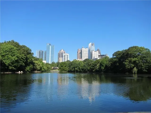 a view of a lake with a city