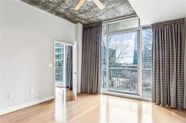 a view of a room with a large window