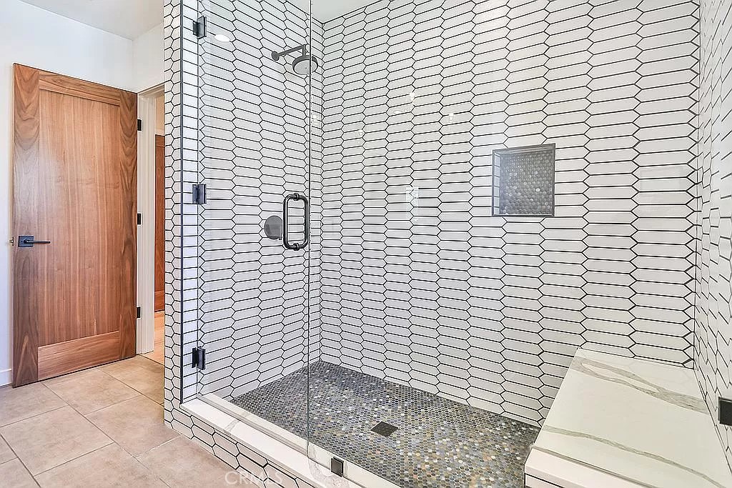 19532 Bermuda Street Porter Ranch, CA 91326 - Photo 42 of 74 a bathroom with a shower