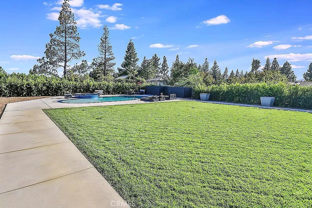 19532 Bermuda Street Porter Ranch, CA 91326 - Photo 66 of 74 a view of a swimming pool and outdoor space