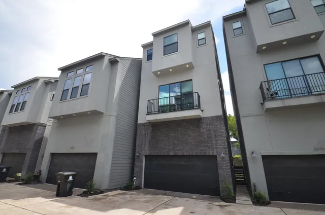 a front view of a house with a garage