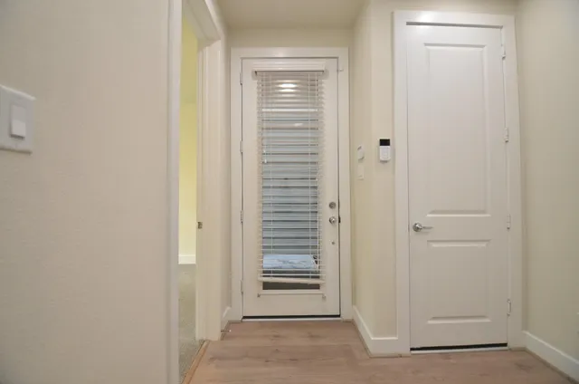 a view of a hallway with elevator