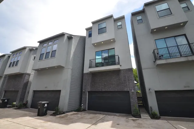 a front view of a house with a garage