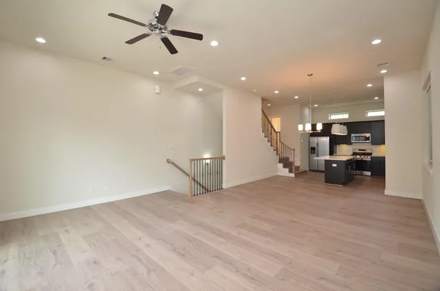 a view of a hall with the front door