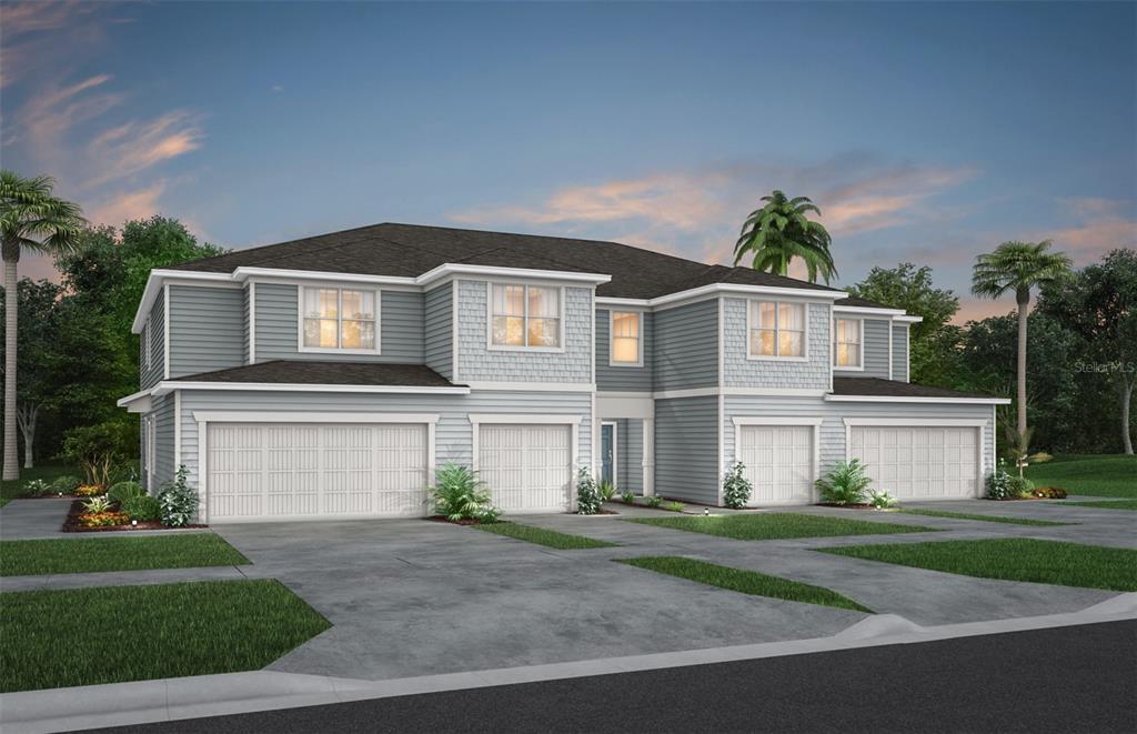 2466 Belle Haven Way Davenport, FL 33896 - Photo 1 of 20 a front view of a house with a yard and a garage