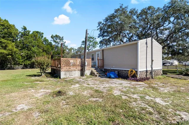a view of a swimming pool with trees