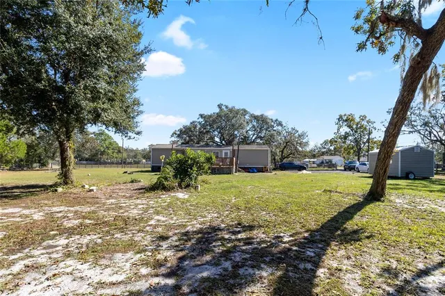 a view of a car park side of a road