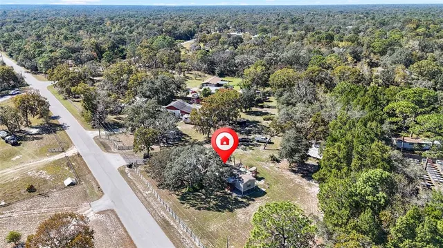 a view of a street with lots of trees