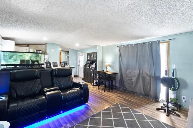 a room with furniture and rug