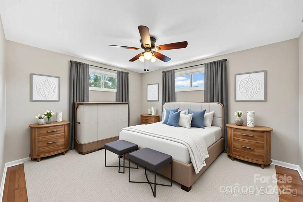 10 Moland Drive Etowah, NC 28729 - Photo 14 of 26 a bedroom with a bed dresser and a window