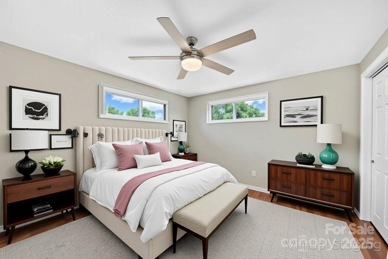 10 Moland Drive Etowah, NC 28729 - Photo 18 of 26 a bedroom with bed and window