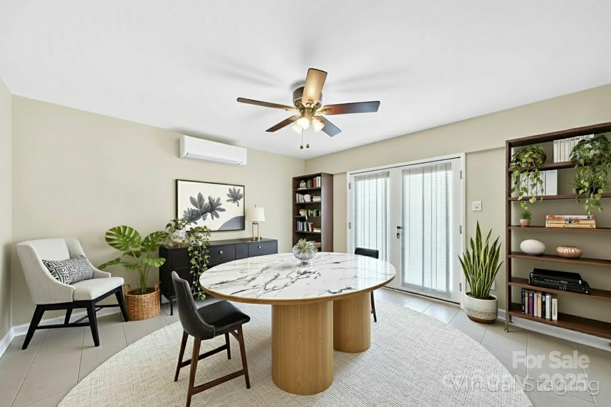 10 Moland Drive Etowah, NC 28729 - Photo 19 of 26 a living room with furniture and a table