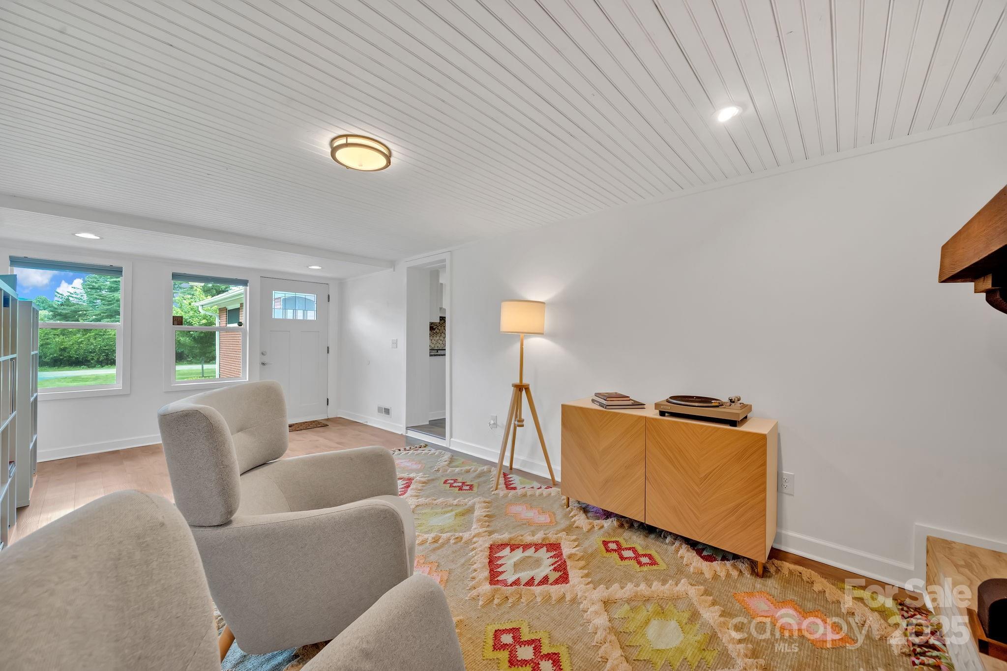 10 Moland Drive Etowah, NC 28729 - Photo 22 of 26 a living room with furniture and a window