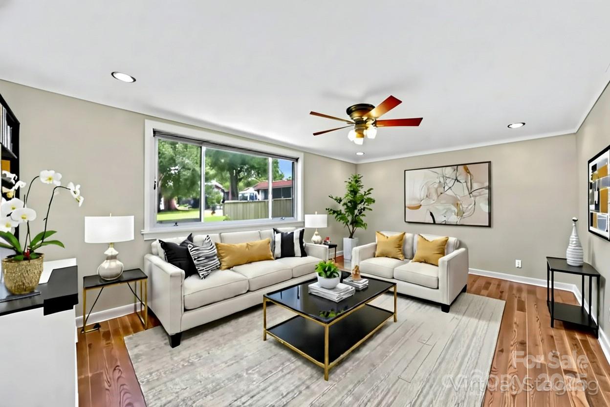 10 Moland Drive Etowah, NC 28729 - Photo 7 of 26 a living room with furniture potted plant and a large window