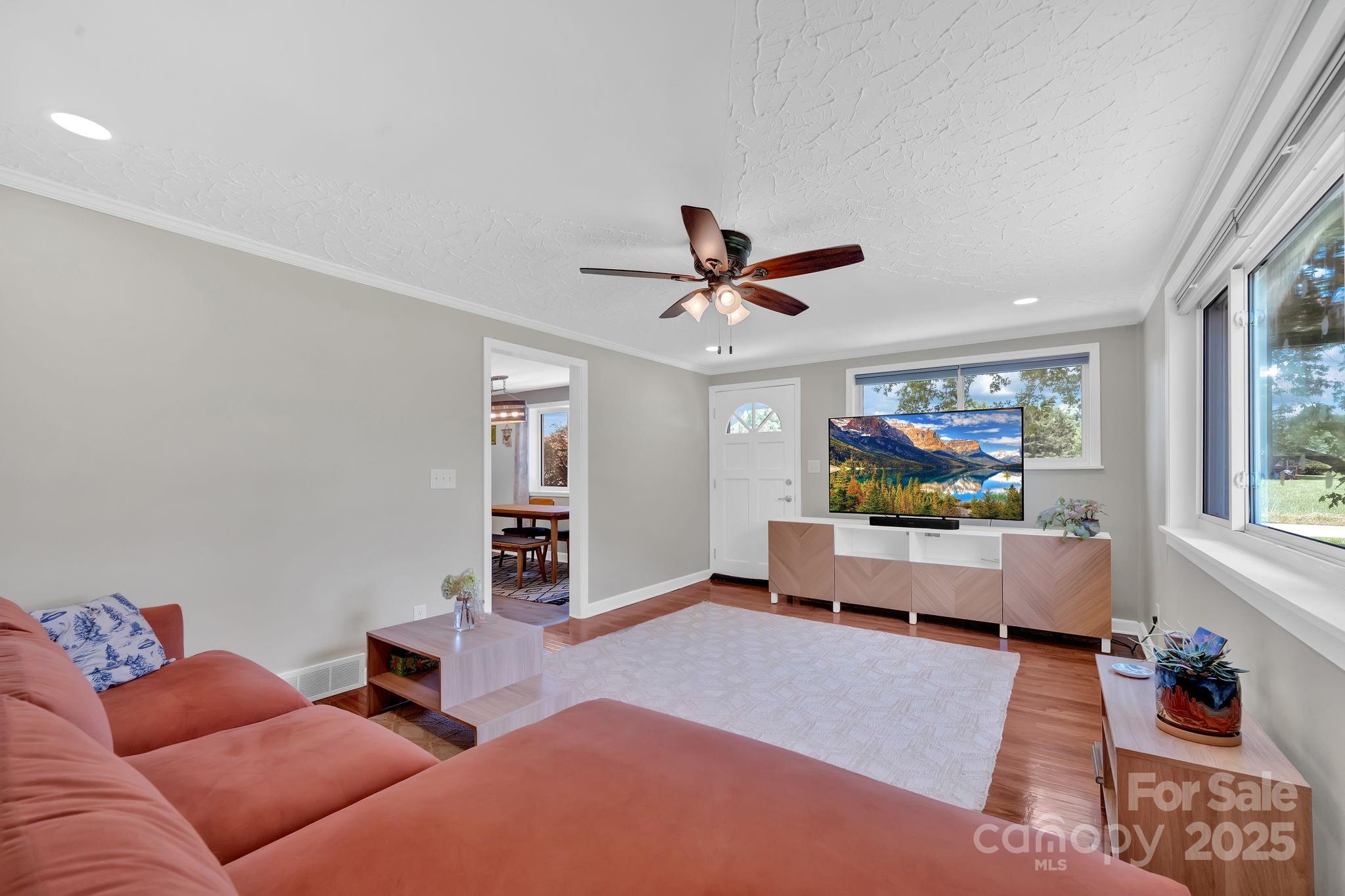 10 Moland Drive Etowah, NC 28729 - Photo 8 of 26 a living room with furniture and a window