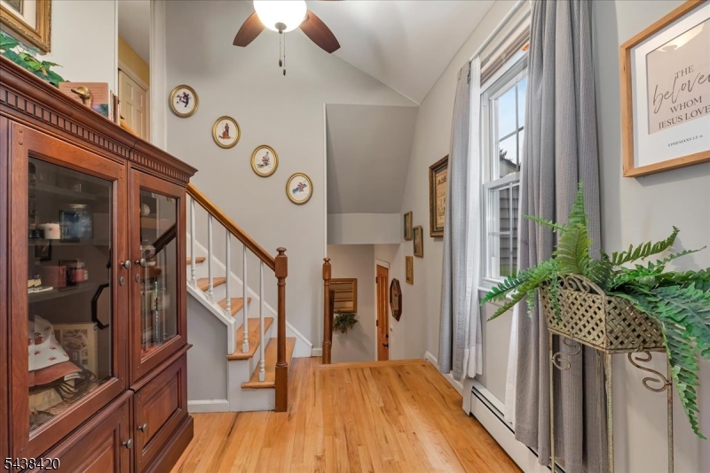 79 Main Street Califon, NJ 07830 - Photo 20 of 50 a view of a hallway with wooden floor and staircase