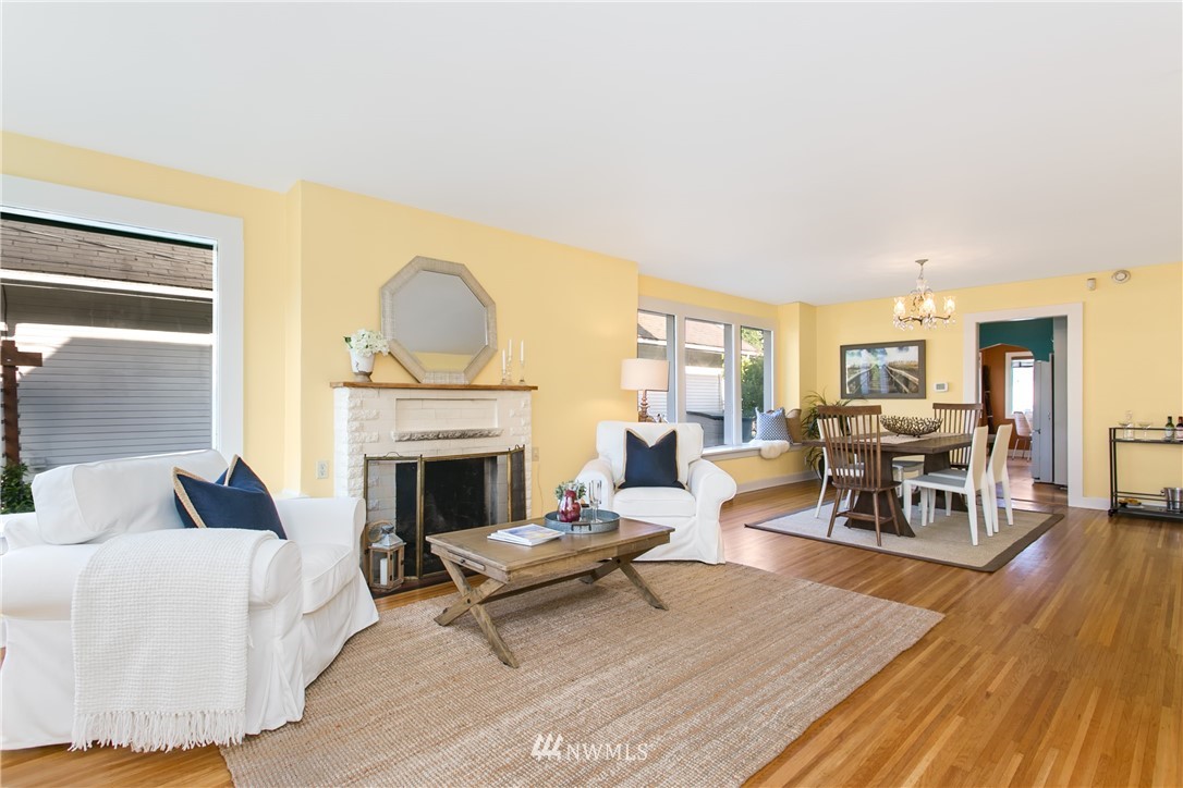 731 North 68th Street Seattle, WA 98103 - Photo 9 of 25 a living room with furniture and a fireplace
