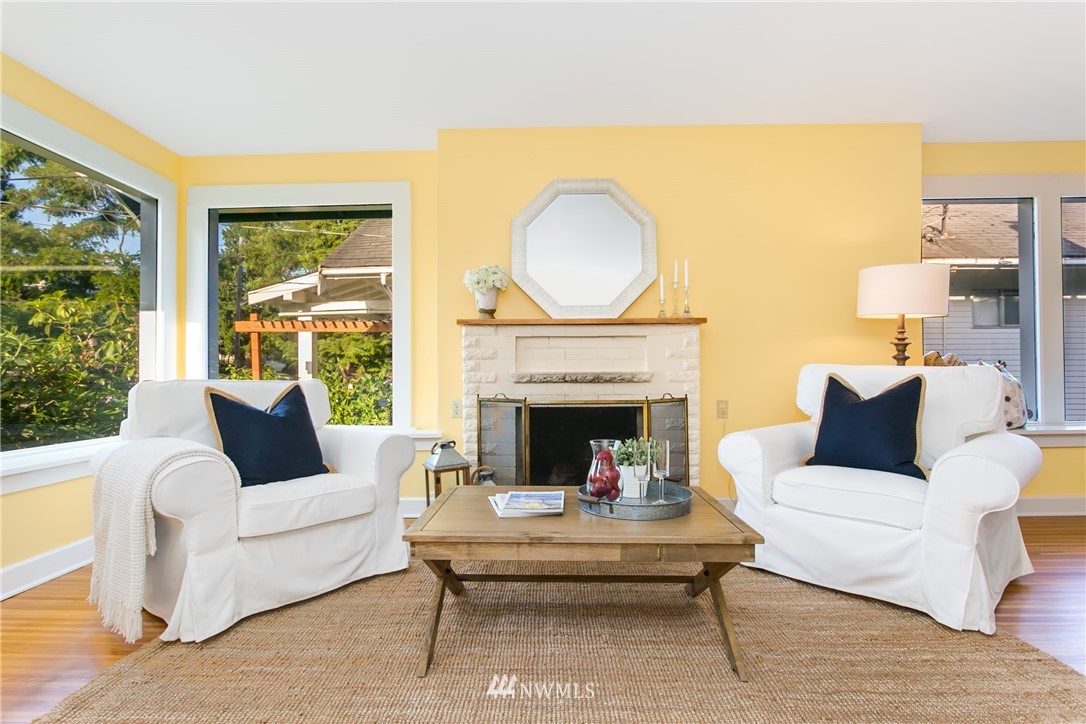 731 North 68th Street Seattle, WA 98103 - Photo 10 of 25 a living room with furniture fireplace and a large window