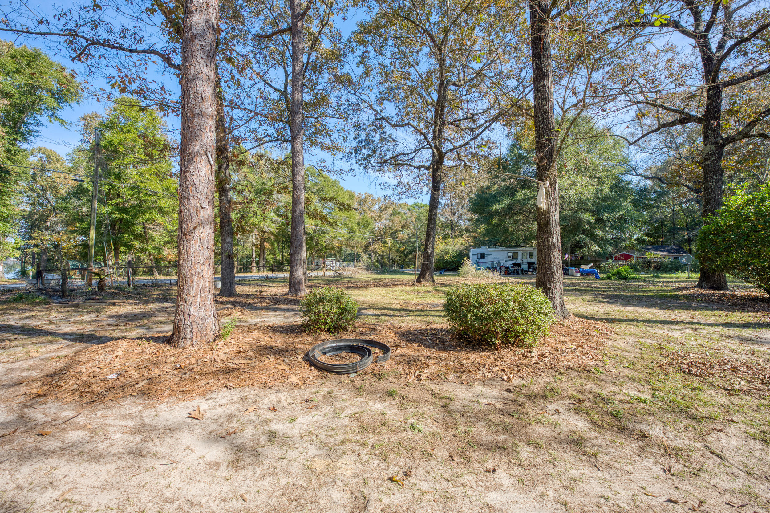 281 Pipers Landing Road DeFuniak Springs, FL 32433 - Photo 6 of 22 a view of a backyard with large trees