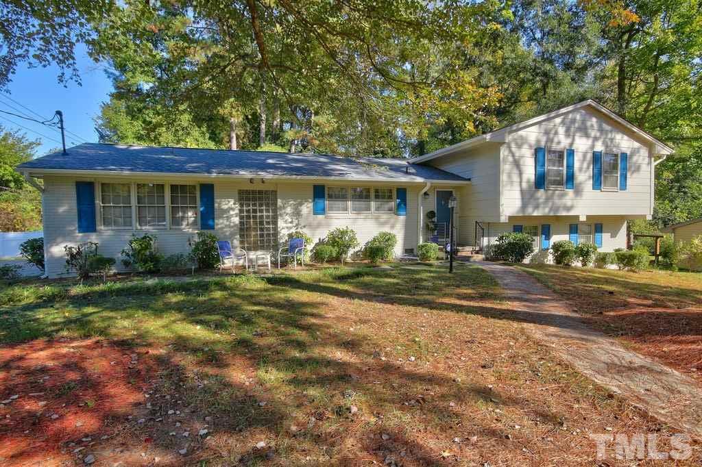 2908 New Hope Church Road Raleigh, NC 27604 - Photo 1 of 24 a view of a house with yard and a garden