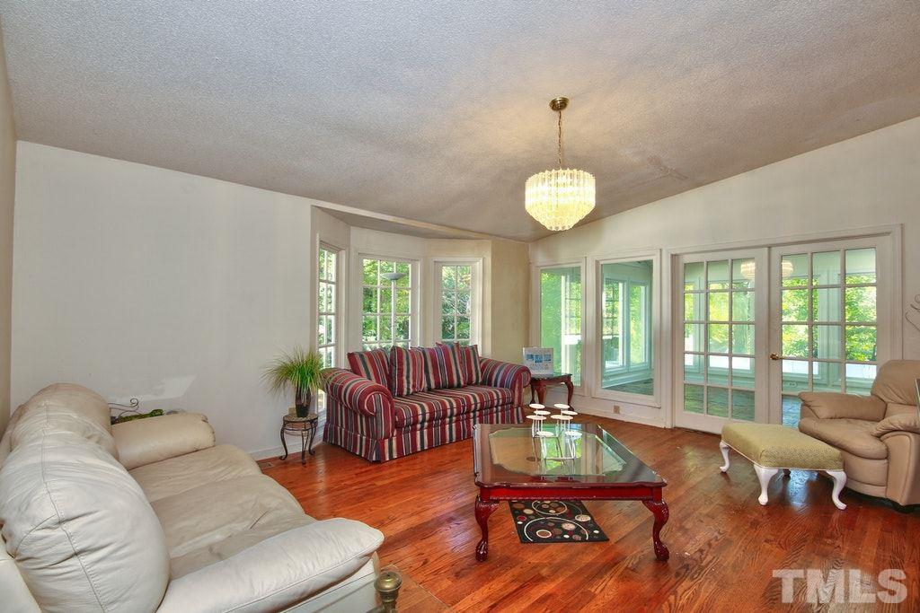 2908 New Hope Church Road Raleigh, NC 27604 - Photo 11 of 24 a living room with furniture and a large window