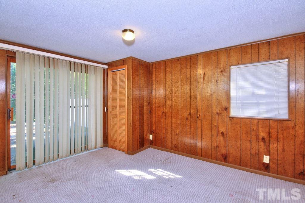 2908 New Hope Church Road Raleigh, NC 27604 - Photo 24 of 24 a view of a room with a wooden door