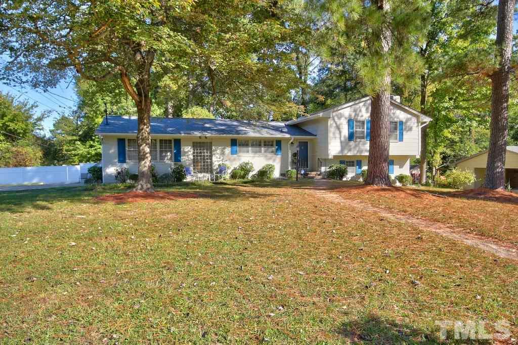 2908 New Hope Church Road Raleigh, NC 27604 - Photo 4 of 24 a front view of a house with a yard