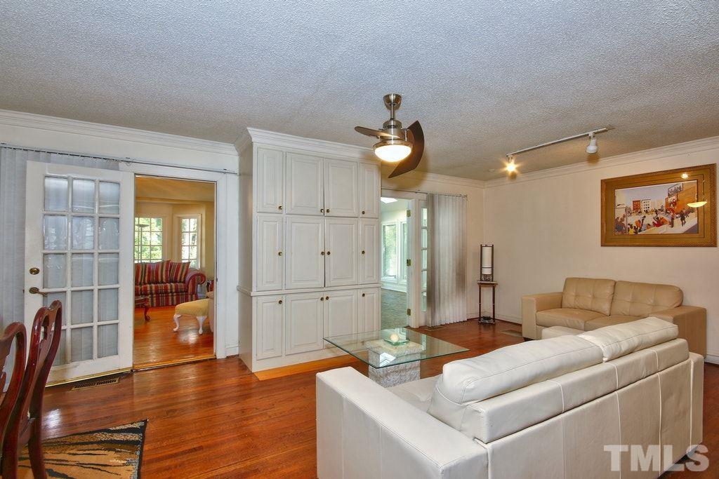 2908 New Hope Church Road Raleigh, NC 27604 - Photo 6 of 24 a living room with furniture and wooden floor