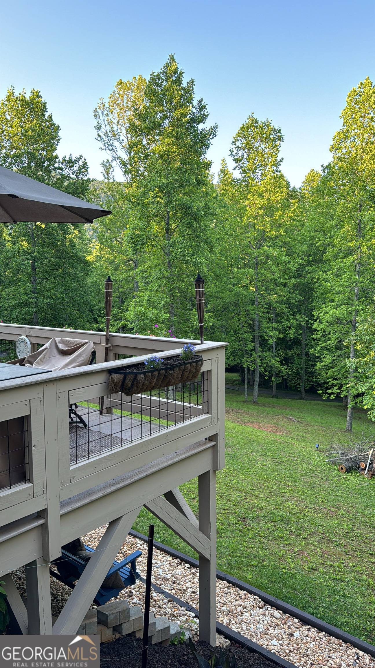 255 Prairie Flower Drive Cleveland, GA 30528 - Photo 11 of 11 a balcony with wooden floor and outdoor seating