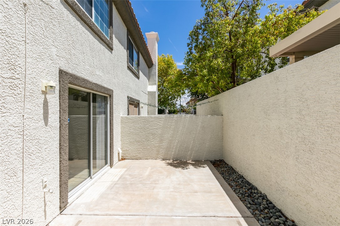 200 Luninborg Street Henderson, NV 89074 - Photo 23 of 40 Private patio area provides a tranquil outdoor retreat for relaxation and entertaining.