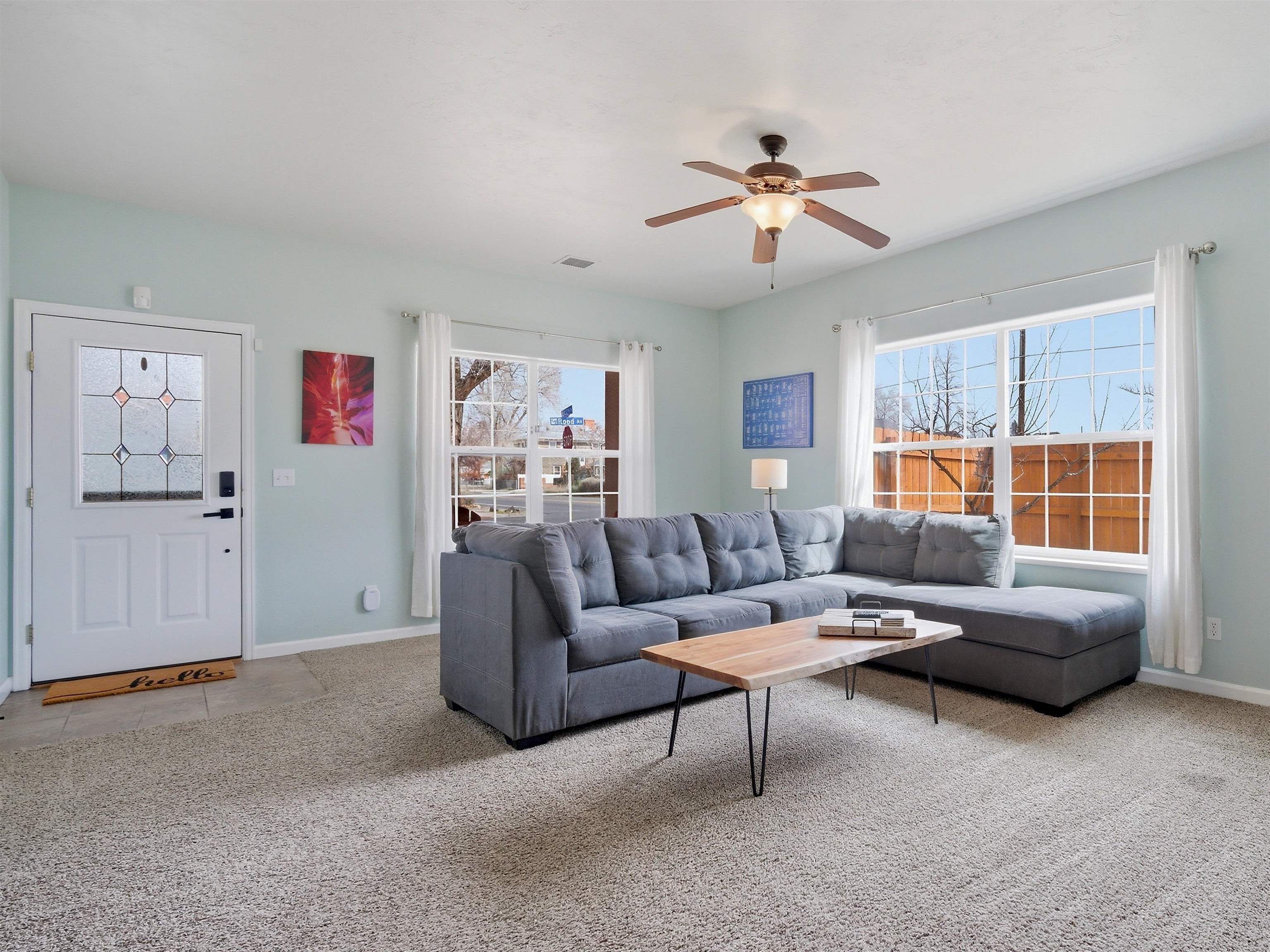 1163 Rood Avenue Grand Junction, CO 81501 - Photo 13 of 36 a living room with furniture and a large window