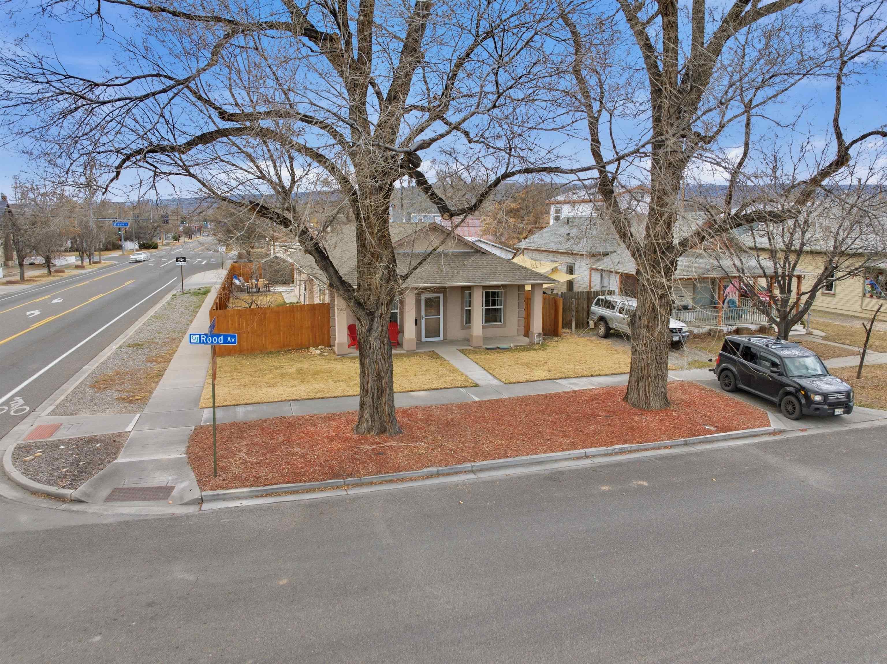 1163 Rood Avenue Grand Junction, CO 81501 - Photo 2 of 36 a view of road with yard
