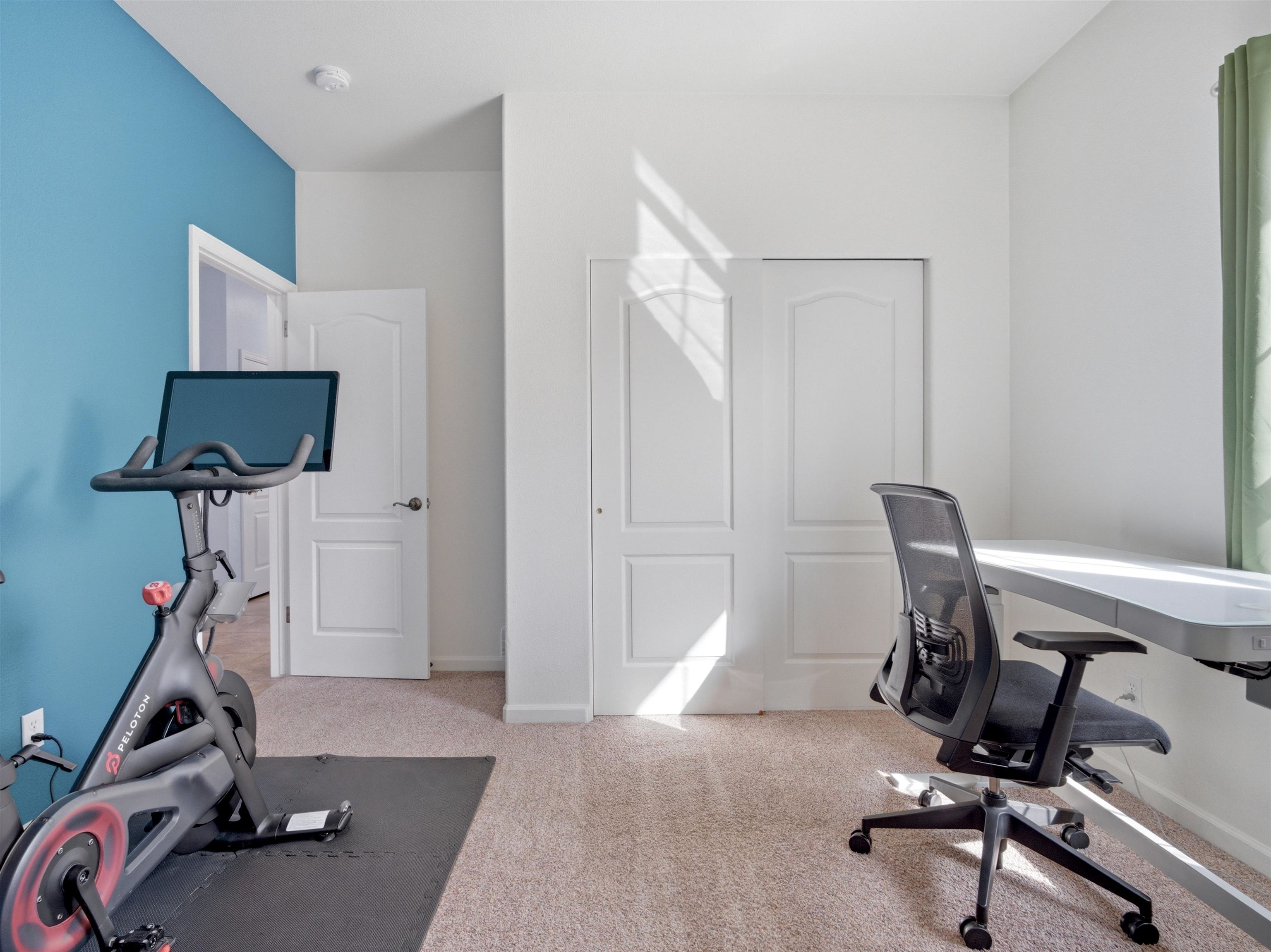 1163 Rood Avenue Grand Junction, CO 81501 - Photo 26 of 36 a view of a room with gym equipment