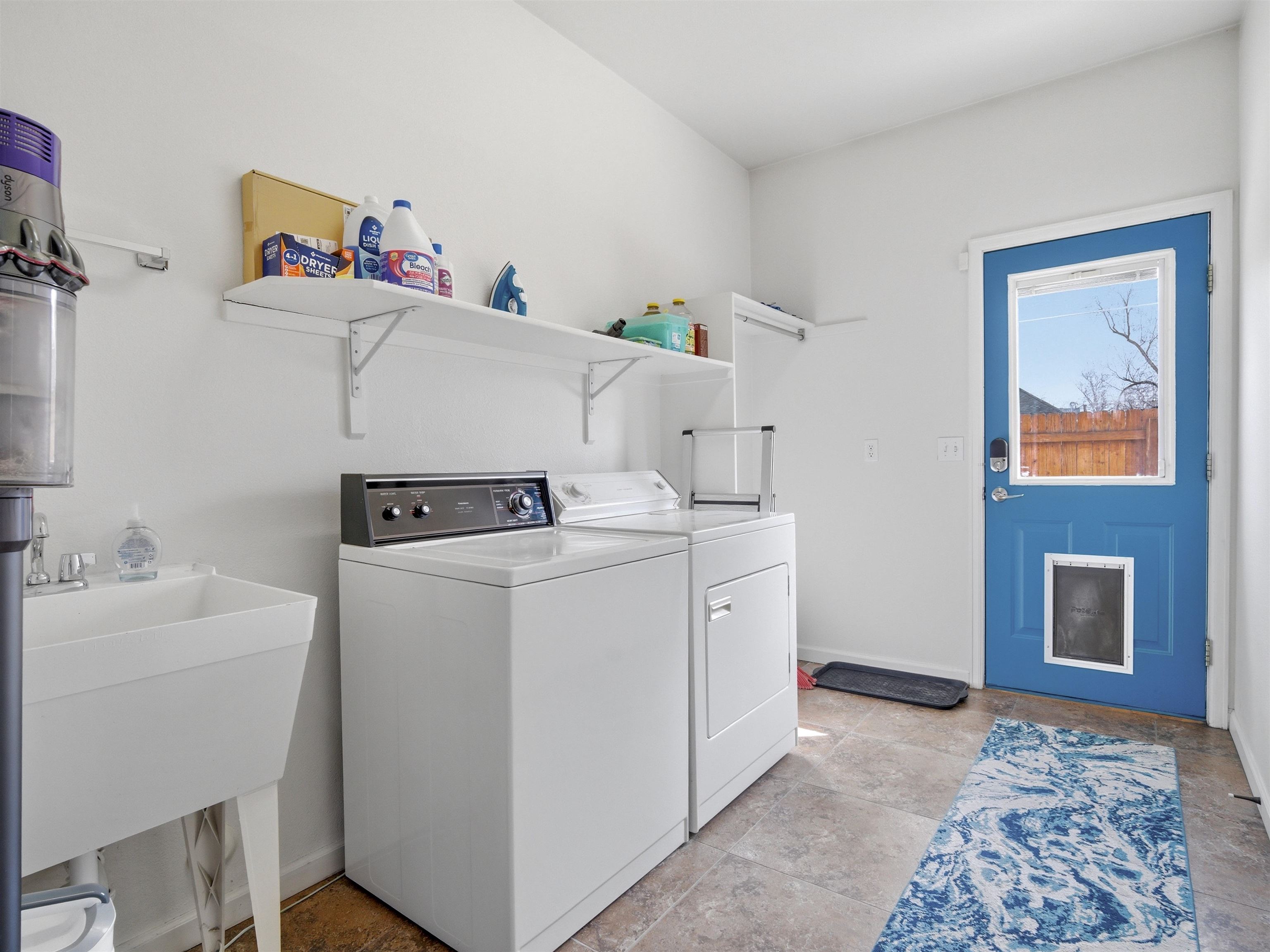 1163 Rood Avenue Grand Junction, CO 81501 - Photo 27 of 36 a utility room with dryer and washer
