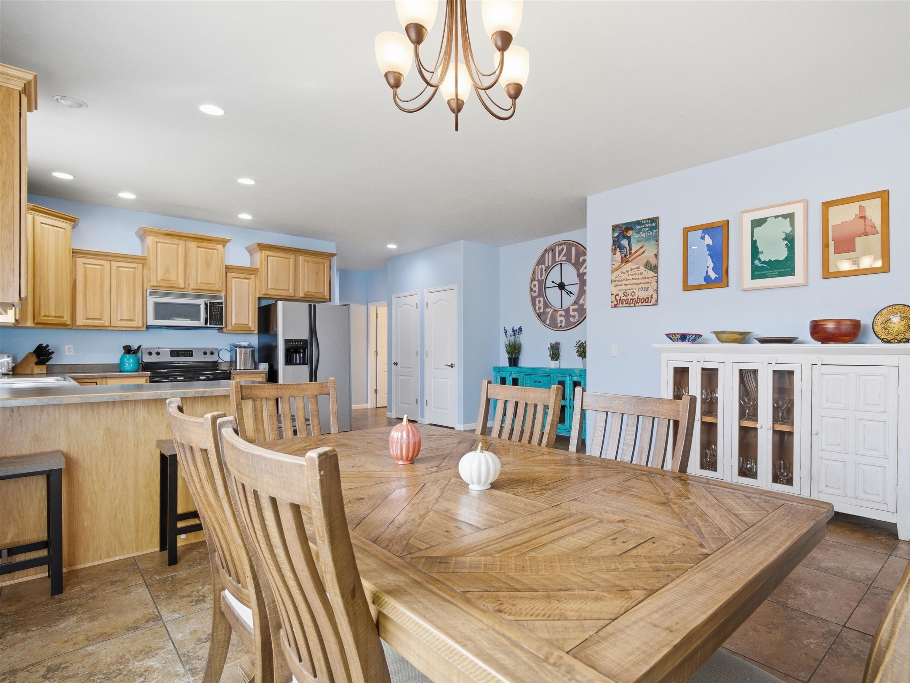 1163 Rood Avenue Grand Junction, CO 81501 - Photo 5 of 36 a view of a dining room with furniture