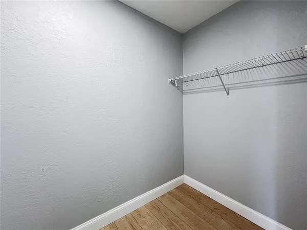 a view of a room with racks on the wall