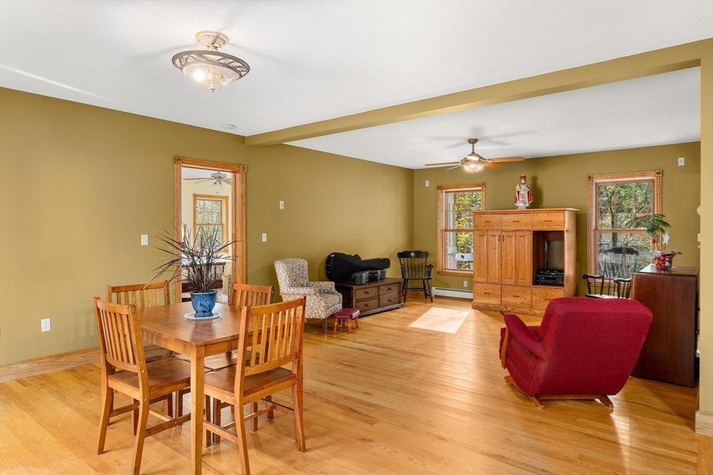 254 Bryant Street Chesterfield, MA 01012 - Photo 20 of 41 a living room with fireplace furniture and a wooden floor
